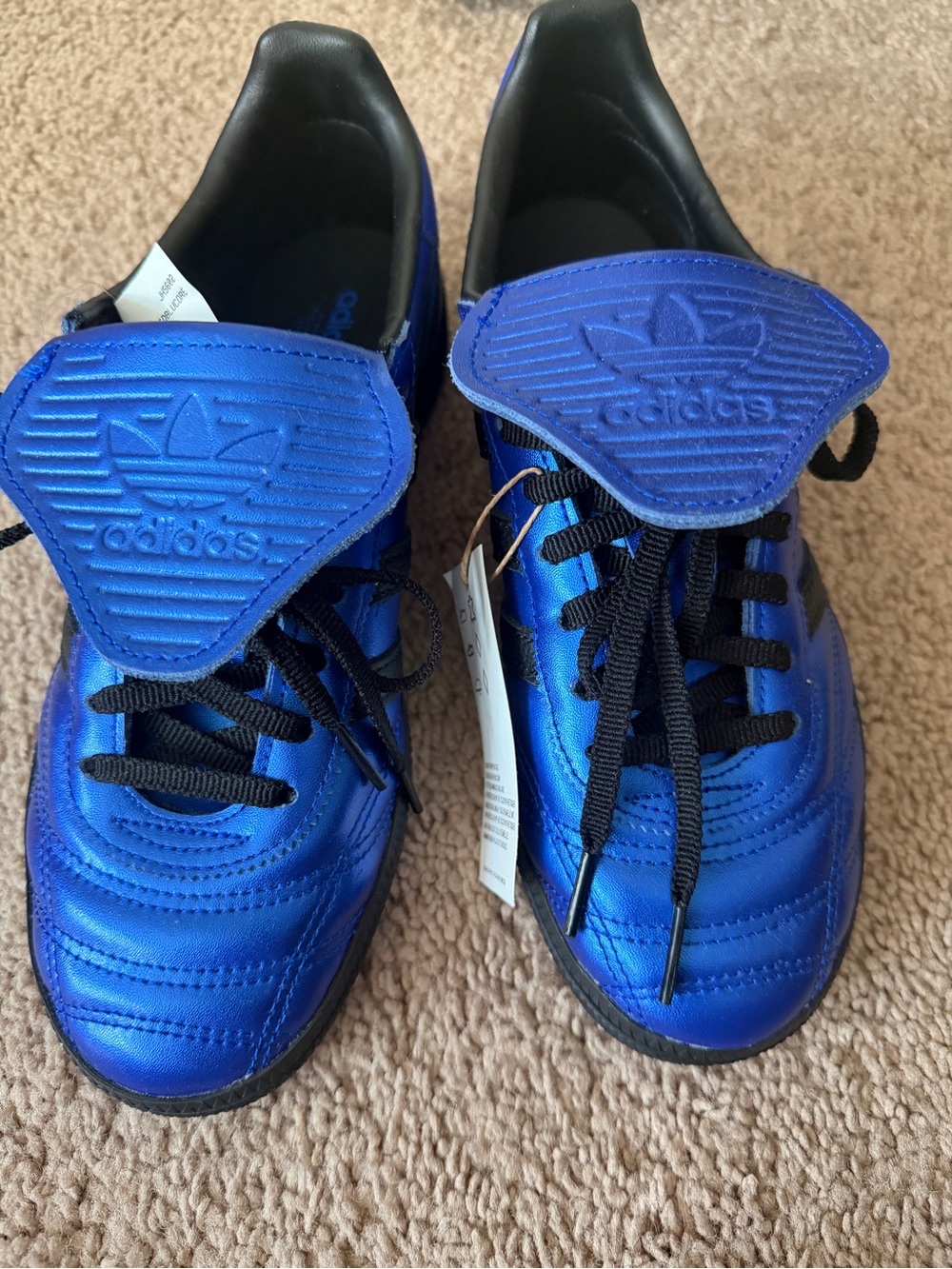 adidas women’s Metallic Blue Athletic Soccer Shoes with Black Accents